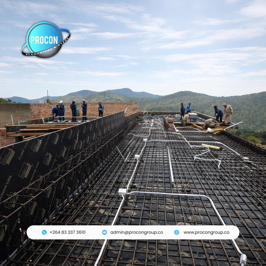 Suspended concrete slab with rebar grid and electrical conduit first-fix